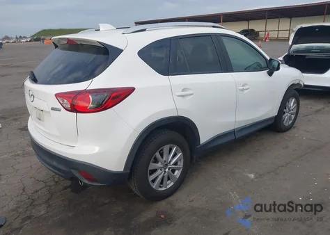 2015 Mazda Cx-5 Touring z USA, uszkodzony, nr VIN JM3KE2CY5F0553864